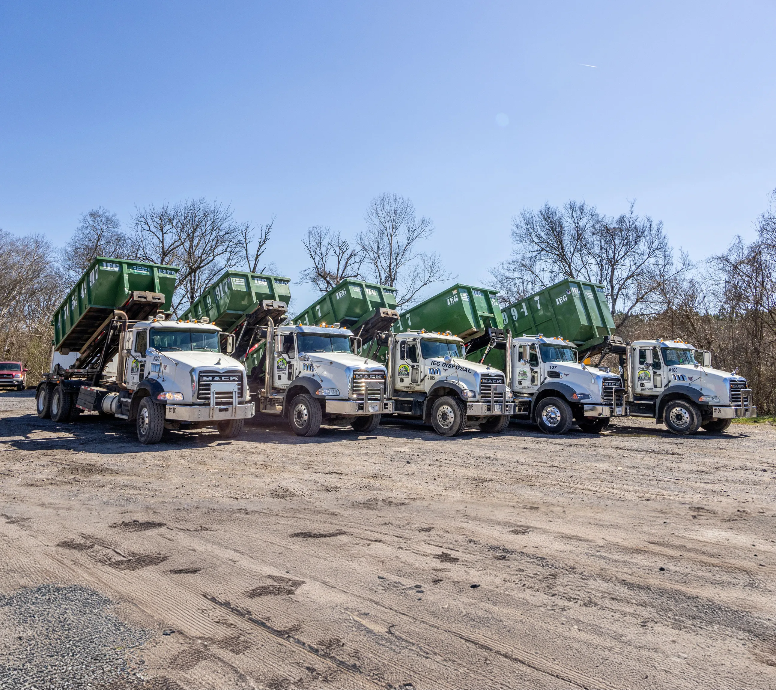 A truck being loaded with debris in a contruction site